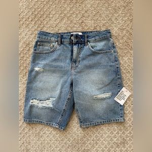 ASOS Design slim denim shorts in mid wash blue tint with raw hem and thigh rips